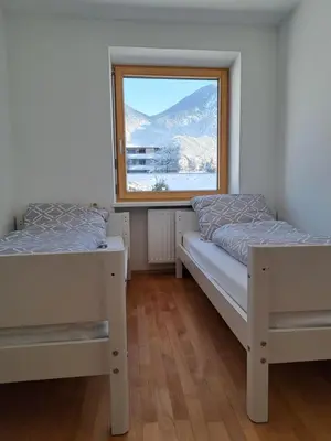Ein Bett oder Betten in einem Zimmer der Unterkunft Bergpanorama