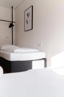 Ein Bett oder Betten in einem Zimmer der Unterkunft homy Bludenz Alpine Panorama