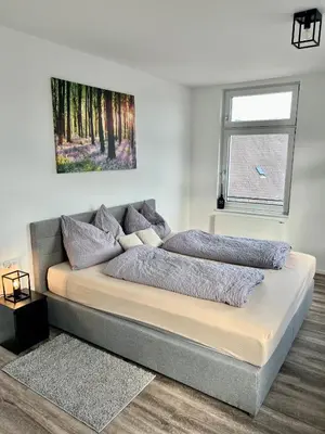 Ein Bett oder Betten in einem Zimmer der Unterkunft Penthouse im Zentrum von Bregenz