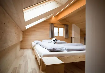 Ein Bett oder Betten in einem Zimmer der Unterkunft Bregenzerwälder Appartements Familie Fink