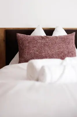 Ein Bett oder Betten in einem Zimmer der Unterkunft Alpenstolz Damüls Haus 1 - Stilvoll urlauben in den Bergen