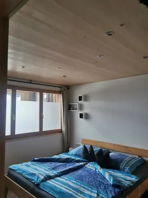Ein Bett oder Betten in einem Zimmer der Unterkunft Bereuter