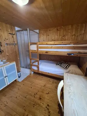 Ein Bett oder Betten in einem Zimmer der Unterkunft Burtscha Lodge