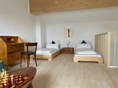 Ein Bett oder Betten in einem Zimmer der Unterkunft Gamsfels Petronella Galeriewohnung
