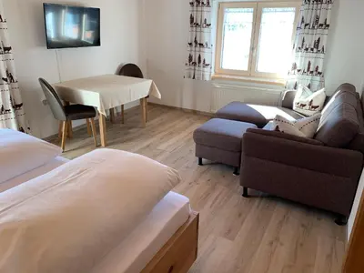 Ein Sitzbereich in der Unterkunft Ferienwohnungen Hörmann