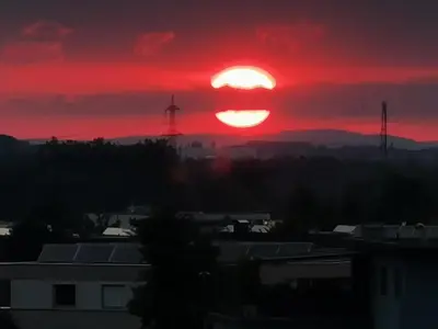 Blick auf den Sonnenuntergang/Sonnenaufgang von der Ferienwohnung aus oder aus der Nähe