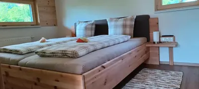 Ein Bett oder Betten in einem Zimmer der Unterkunft Ferienwohnung Sapatho