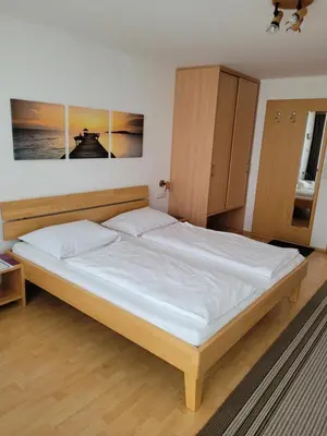 Ein Bett oder Betten in einem Zimmer der Unterkunft Gästezimmer Suppan