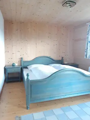 Ein Bett oder Betten in einem Zimmer der Unterkunft Ferienhaus Albrecht