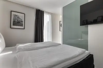 Ein Bett oder Betten in einem Zimmer der Unterkunft Motel by Maier Feldkirch - kontaktloser Check-in