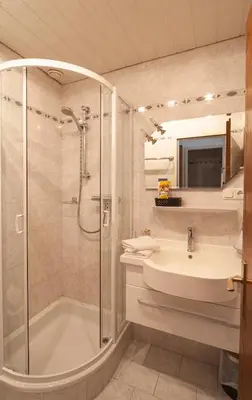Ein Badezimmer in der Unterkunft Hotel Garni Brigitte