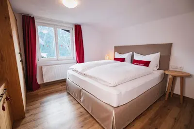 Ein Bett oder Betten in einem Zimmer der Unterkunft Haller's Apartments