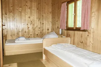 Ein Bett oder Betten in einem Zimmer der Unterkunft Ferienhaus Schetteregg