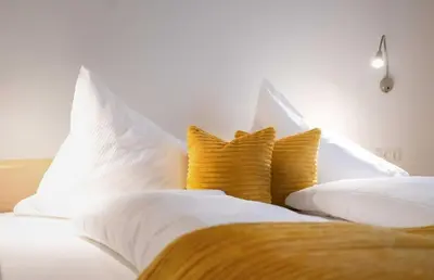 Ein Bett oder Betten in einem Zimmer der Unterkunft Rosis Ferienwohnung