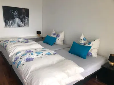 Ein Bett oder Betten in einem Zimmer der Unterkunft Ferienwohnung am Bodensee - Ruhe,Natur und Golfgenuss