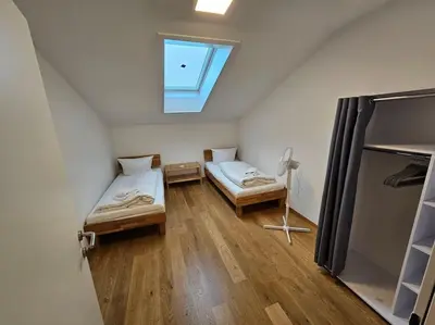 Ein Bett oder Betten in einem Zimmer der Unterkunft Ach18, Bregenz, Vorarlberg Apartments