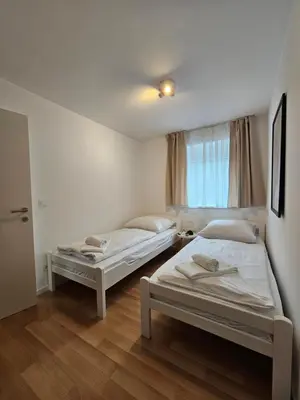 Ein Bett oder Betten in einem Zimmer der Unterkunft Ach18, Bregenz, Vorarlberg Apartments