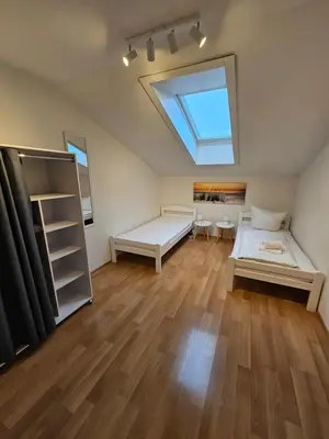 Ein Bett oder Betten in einem Zimmer der Unterkunft Ach18, Bregenz, Vorarlberg Apartments