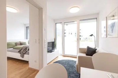 Ein Bett oder Betten in einem Zimmer der Unterkunft Smart Living Dornbirn