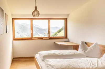 Ein Bett oder Betten in einem Zimmer der Unterkunft Berg Aparts Faschina - 13 - b42795