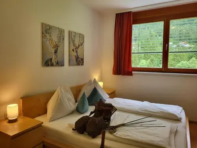 Ein Bett oder Betten in einem Zimmer der Unterkunft Top Appartements