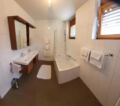 Ein Badezimmer in der Unterkunft Top Appartements