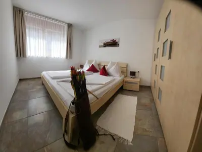 Ein Bett oder Betten in einem Zimmer der Unterkunft Top Appartements
