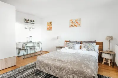 Ein Bett oder Betten in einem Zimmer der Unterkunft Cocoon Studio