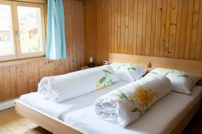 Ein Bett oder Betten in einem Zimmer der Unterkunft Haus OmaGermana