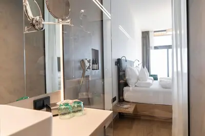 Ein Bett oder Betten in einem Zimmer der Unterkunft Fritsch am Berg - Adults only