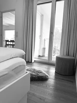 Ein Bett oder Betten in einem Zimmer der Unterkunft Die Bludenzerin