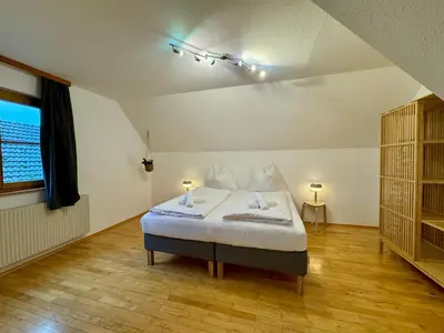 Ein Bett oder Betten in einem Zimmer der Unterkunft Charmantes Bauernchalet Alois
