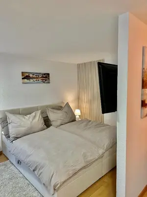 Ein Bett oder Betten in einem Zimmer der Unterkunft Ferienwohnung zwischen Hafen und Stadt
