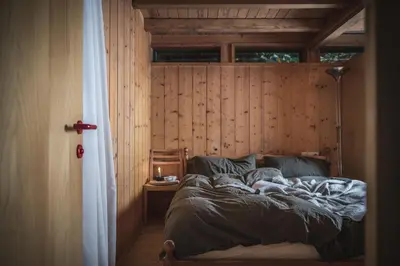 Ein Bett oder Betten in einem Zimmer der Unterkunft Bregenzerwald Ferienhaus