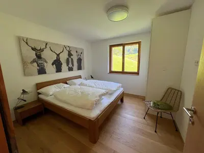 Ein Bett oder Betten in einem Zimmer der Unterkunft Sonnberg Aparts