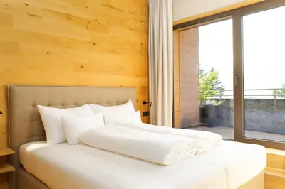 Ein Bett oder Betten in einem Zimmer der Unterkunft Heimat 1495m Appartement TYP 2