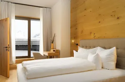 Ein Bett oder Betten in einem Zimmer der Unterkunft Heimat 1495m Appartement TYP 3
