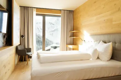 Ein Bett oder Betten in einem Zimmer der Unterkunft Heimat 1495m Appartement TYP 5