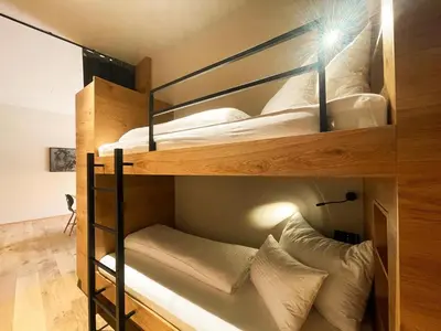 Ein Bett oder Betten in einem Zimmer der Unterkunft Wohnung in Schröcken nahe Ski Arlberg
