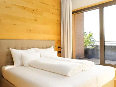 Ein Bett oder Betten in einem Zimmer der Unterkunft Wohnung in Schröcken nahe Ski Arlberg