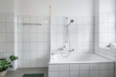 Ein Badezimmer in der Unterkunft Stylische Altbauwohnung Bregenz am See