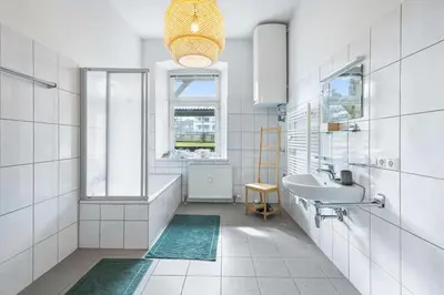 Ein Badezimmer in der Unterkunft Stylische Altbauwohnung Bregenz am See