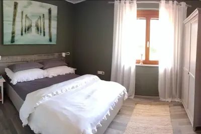 Ein Bett oder Betten in einem Zimmer der Unterkunft Liebevoll eingerichtete Wohnung