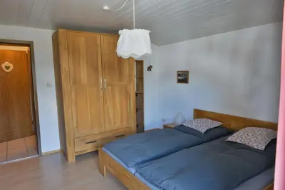 Ein Bett oder Betten in einem Zimmer der Unterkunft Bergführer-Hüsle