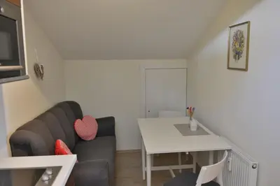 Ein Sitzbereich in der Unterkunft Bergführer-Hüsle