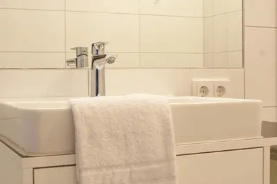 Ein Badezimmer in der Unterkunft Aparthouse Leonhard