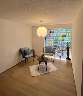 Ein Sitzbereich in der Unterkunft Panorama Appartements