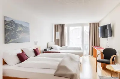 Ein Bett oder Betten in einem Zimmer der Unterkunft Hotel Löwen