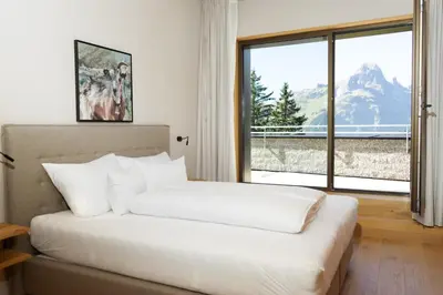 Ein Bett oder Betten in einem Zimmer der Unterkunft Heimat 1495 Appartements - TYP 7
