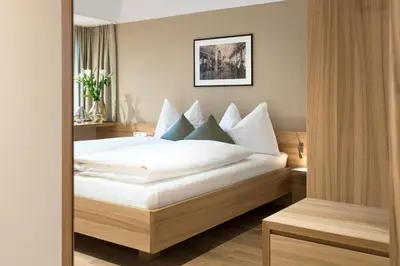 Ein Bett oder Betten in einem Zimmer der Unterkunft Hotel Johann